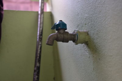Close-up of pipe on wall