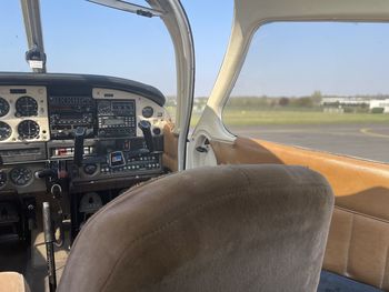 Close-up of airplane against sky