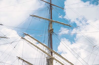 Low angle view of mast against sky