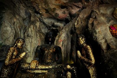 Low angle view of illuminated cave