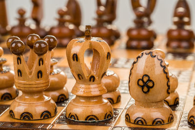 Close-up of chess piece on chess board