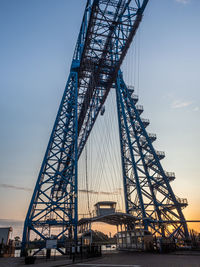 Middlesbrough transporter bridge at sunrise. it carries people and cars  in a suspended gondola