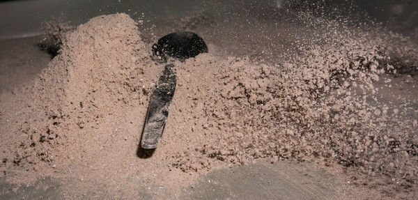 Full length of man playing in mud