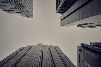 Low angle view of modern buildings against clear sky