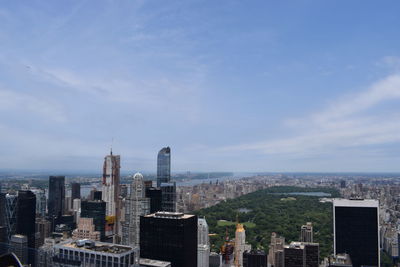 Modern buildings in city against sky