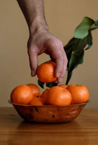 Close-up of orange fruit on table