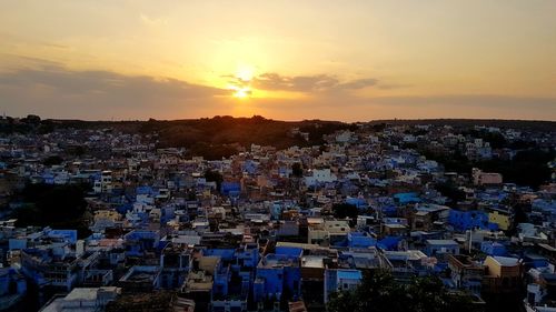 High angle view of townscape against sky during sunset