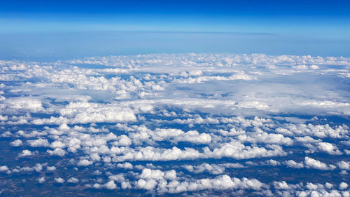 Aerial view of cloudscape against blue sky