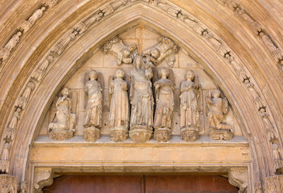 Low angle view of sculptures on wall