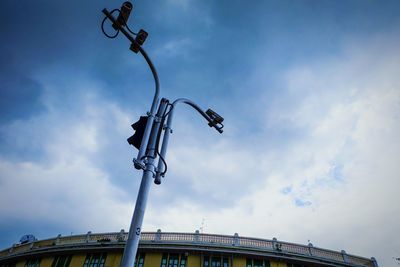 Low angle view of street light against sky