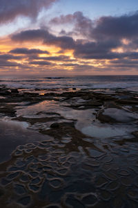 Scenic view of sea against sky during sunset