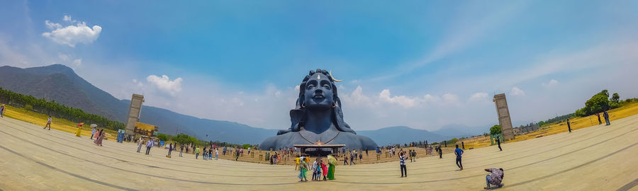 Panoramic view of statue against sky