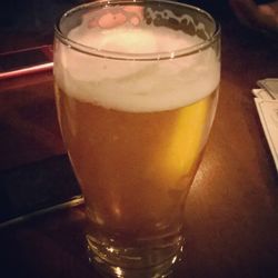 Close-up of beer on table