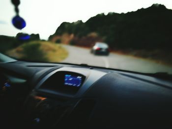 Road seen through car windshield