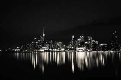 Illuminated buildings in city at night