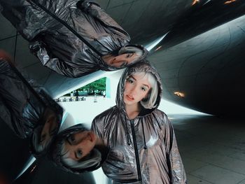 Portrait of father and daughter standing on floor