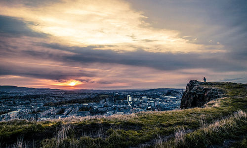 Scenic view of landscape against sky during sunset