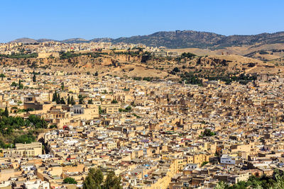 Aerial view of townscape against sky