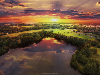 Scenic view of landscape against sky during sunset