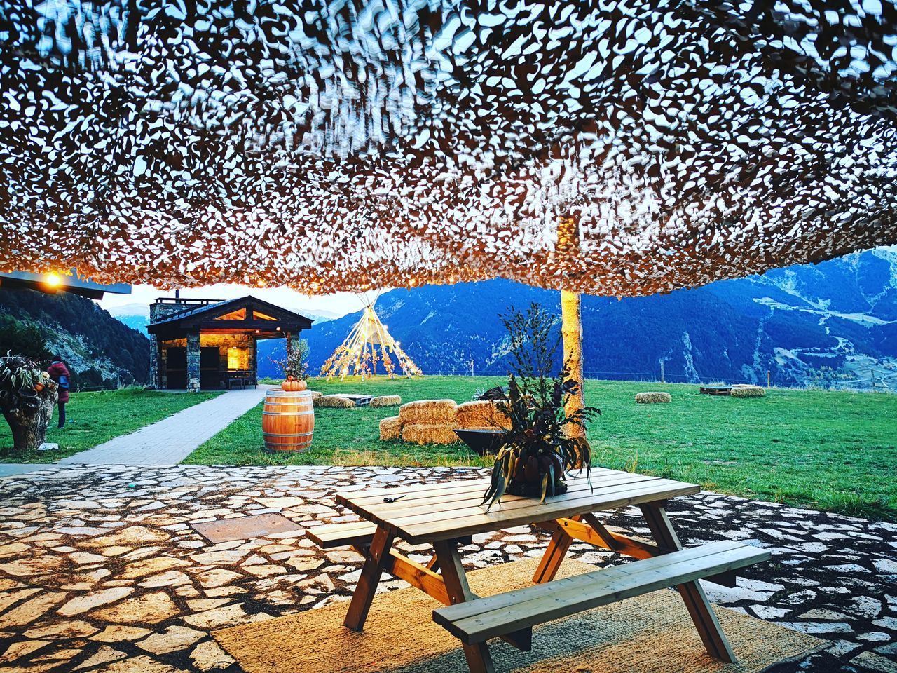 VIEW OF CHAIRS ON TABLE AT RESORT