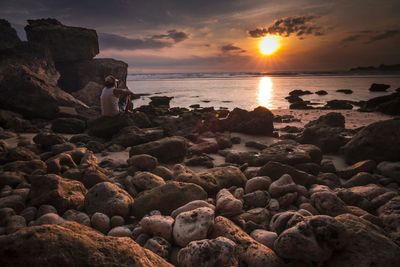 Scenic view of sea at sunset