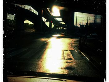 Road seen through car windshield