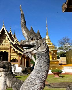 Statue of temple in building