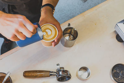 Midsection of woman working on table