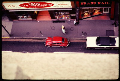 Close-up of red car on road