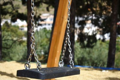 Close-up of swing in park
