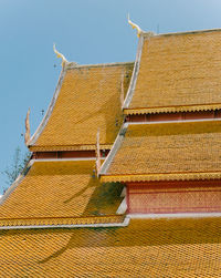 Low angle view of roof against sky