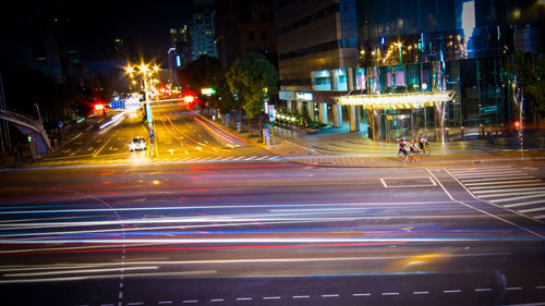 Light trails on city street at night