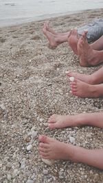 Close-up of woman standing on beach