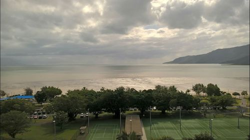 Scenic view of sea against cloudy sky