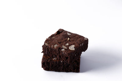 Close-up of chocolate cake against white background