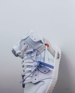 High angle view of shoes on table against white background