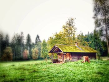 House on grassy field