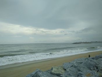 Scenic view of beach against sky