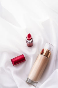 Close-up of beauty products on white background