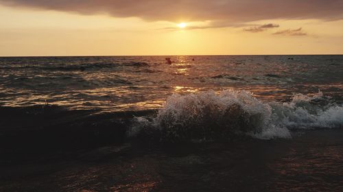 Scenic view of sea against sky during sunset