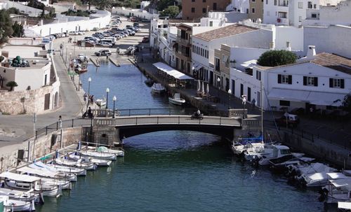 High angle view of bridge and boats moored in river