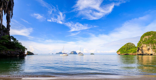 Rai lay beach and yacht tourists floating in sea at krabi province, south of thailand