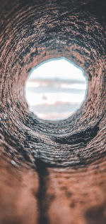 Directly below shot of window against sky