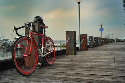 Bicycle parked on pier