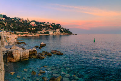 Scenic view of sea against sky during sunset