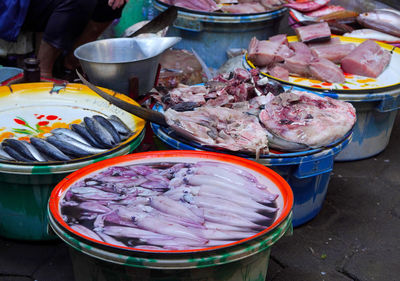 Photo of fresh seafoods in traditional market, banyuwangi, east java, indonesia. street photography