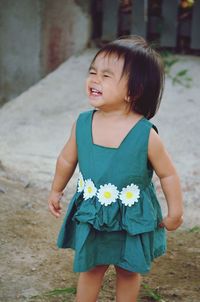 Young woman standing at park