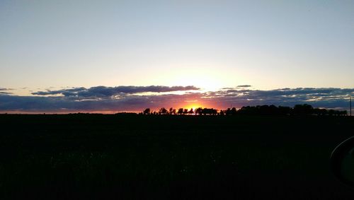 Scenic view of landscape at sunset