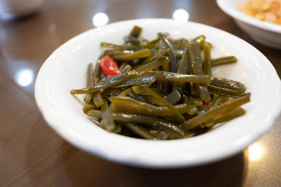 Close-up of pasta in plate on table