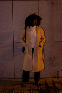 Young woman standing on street